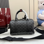 Dark gray GG monogram handbag with top handles and wide shoulder strap