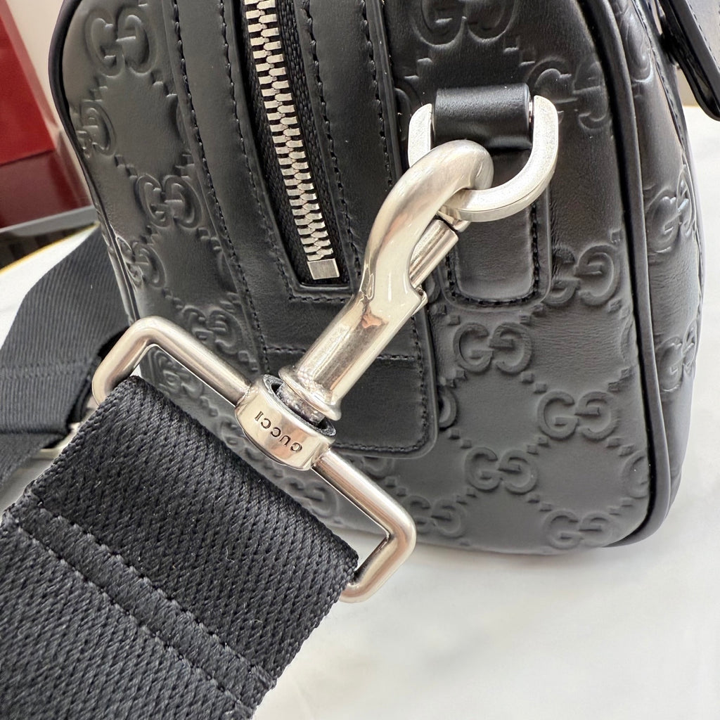 Embossed GG shoulder bag with silver D-ring strap attachment