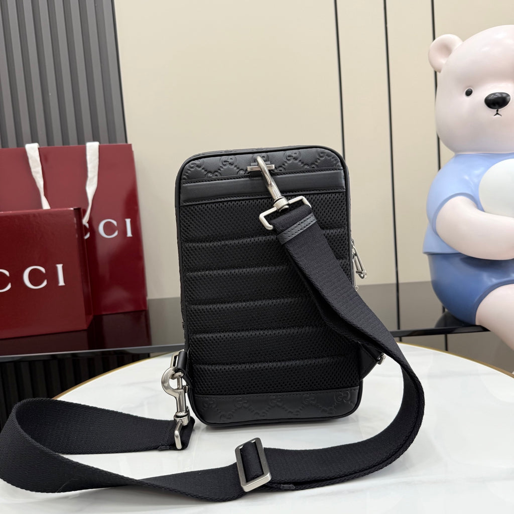 Gucci monogram crossbody bag with adjustable shoulder strap, dark gray/black