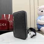 Gucci monogram crossbody bag back view with vertical zip, dark gray/black