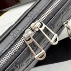 Gucci crossbody bag hardware close-up with silver buckles and zipper