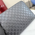 Black Gucci GG monogram embossed small pouch bag with textured finish