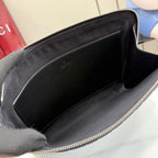 Gucci pouch bag interior view with black fabric lining and zippered opening.