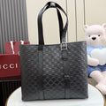 Gucci small tote bag in dark gray with GG monogram, top handles and front strap