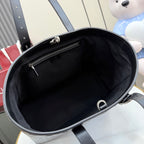 Tote bag interior view with dark lining and small zip pocket