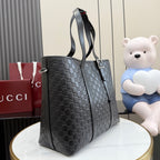 Tote bag in dark gray monogram canvas with side handles and top buckle