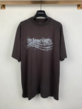 Black crew-neck T-shirt with distressed Balenciaga-style logo graphic on front