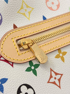Gold zipper pull on multicolor monogram hobo bag with yellow stitch trim