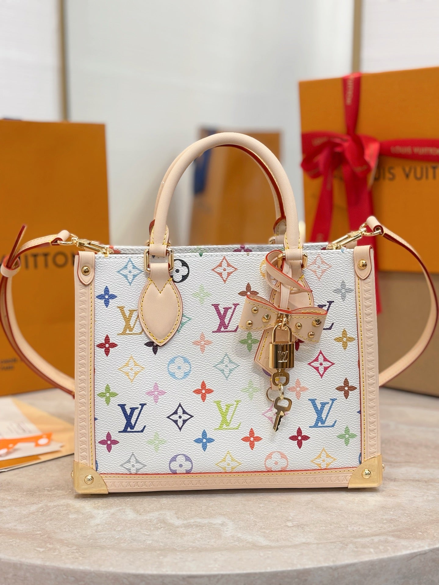 Multicolor monogram handbag with top handles and gold-tone hardware