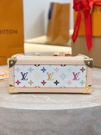 Multicolor monogram handbag with front bar hardware and top opening