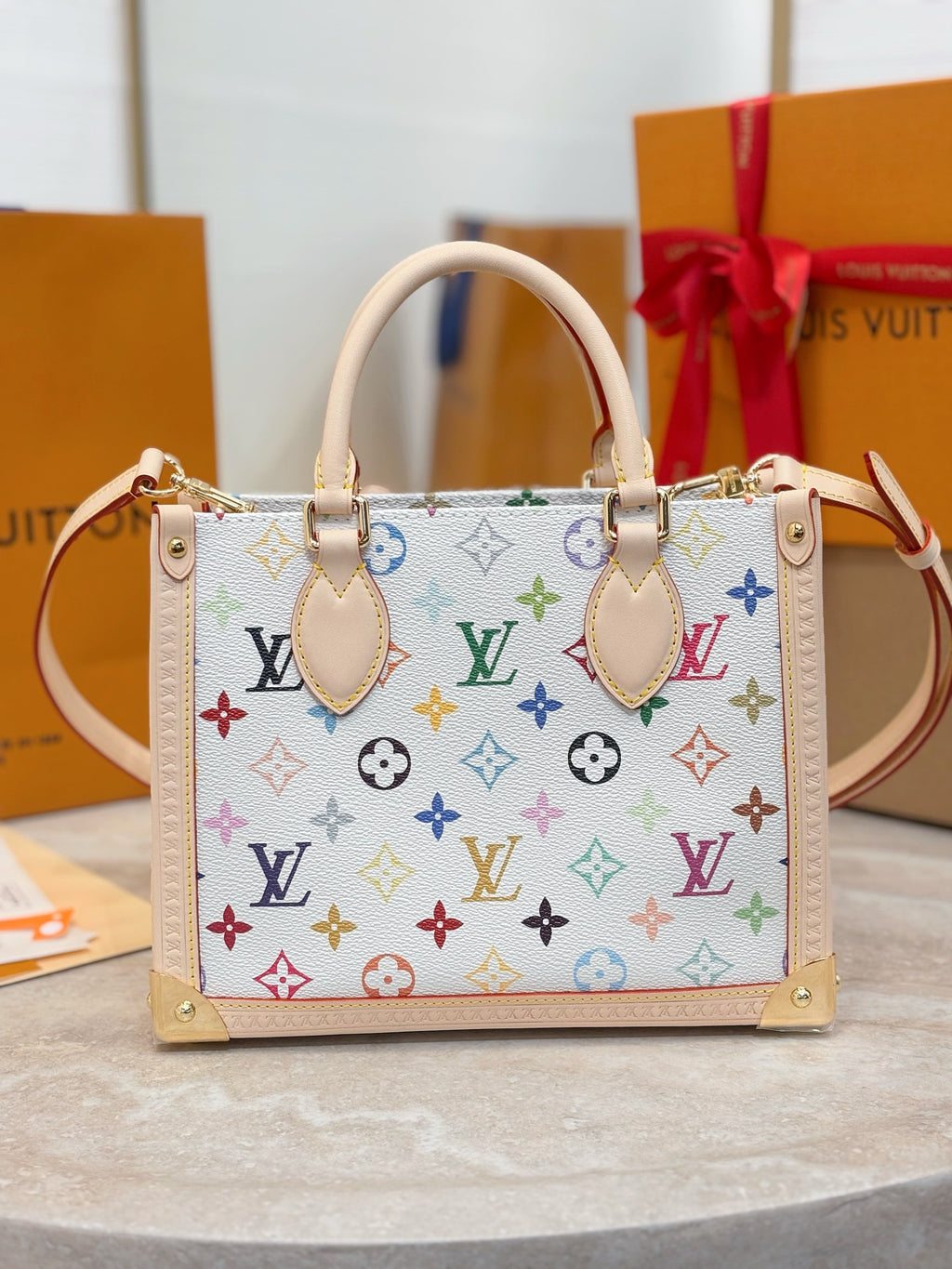 Multicolor monogram handbag with shoulder strap and gold-tone hardware