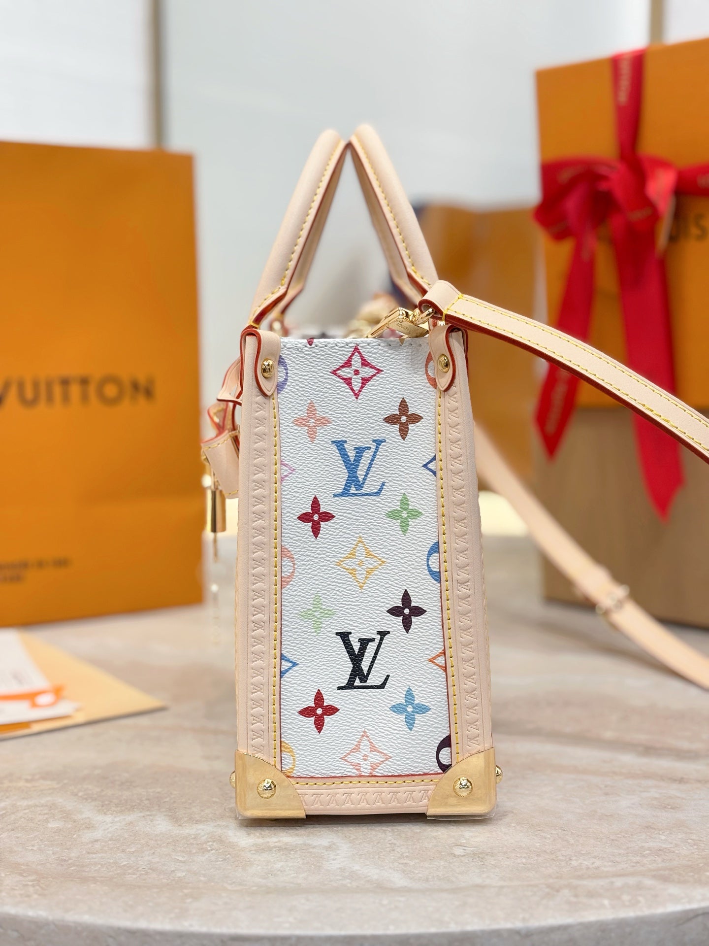 Multicolor monogram mini handbag with shoulder strap and gold-tone corners