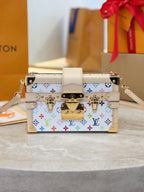 Louis Vuitton mini bag with multicolor Monogram print, beige trim, gold hardware, shoulder strap