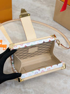 Louis Vuitton mini bag open interior with beige lining, multicolor Monogram trim, gold studs