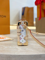 Louis Vuitton mini bag side view with multicolor Monogram print, beige straps and gold hardware