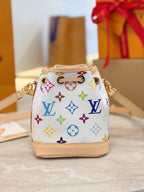 Louis Vuitton drawstring bag with multicolor monogram print and tan leather trim