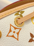 Louis Vuitton bag strap loop with gold hardware and multicolor monogram pattern