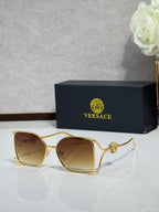Versace sunglasses with gold metal frame and brown tinted lenses