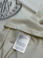 Cream T-shirt with white care label inside neckline