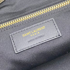 Saint Laurent Paris leather label with Made in Italy on dark green tote bag
