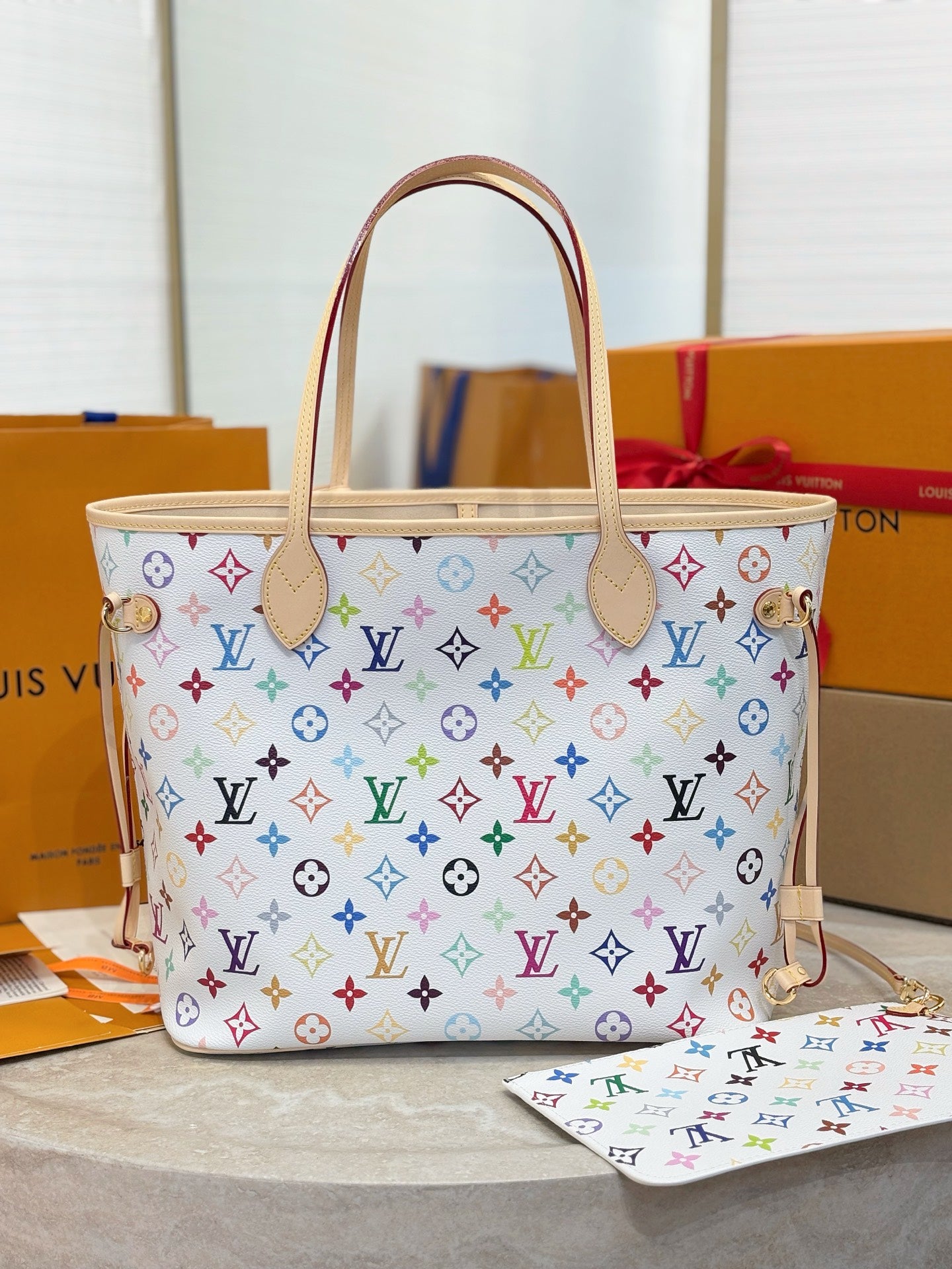 Louis Vuitton medium tote bag with multicolor monogram print and detachable matching pouch