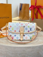 Louis Vuitton crossbody bag with multicolor monogram print, front flap and chain strap