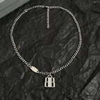 Silver-tone chain necklace with oval tag and square charm pendant