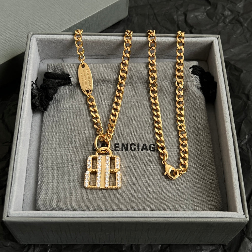 Balenciaga accessory gold chain necklace with square B logo pendant in box