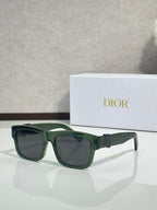 Dark green square sunglasses with dark lenses and gold logo detail on temples.