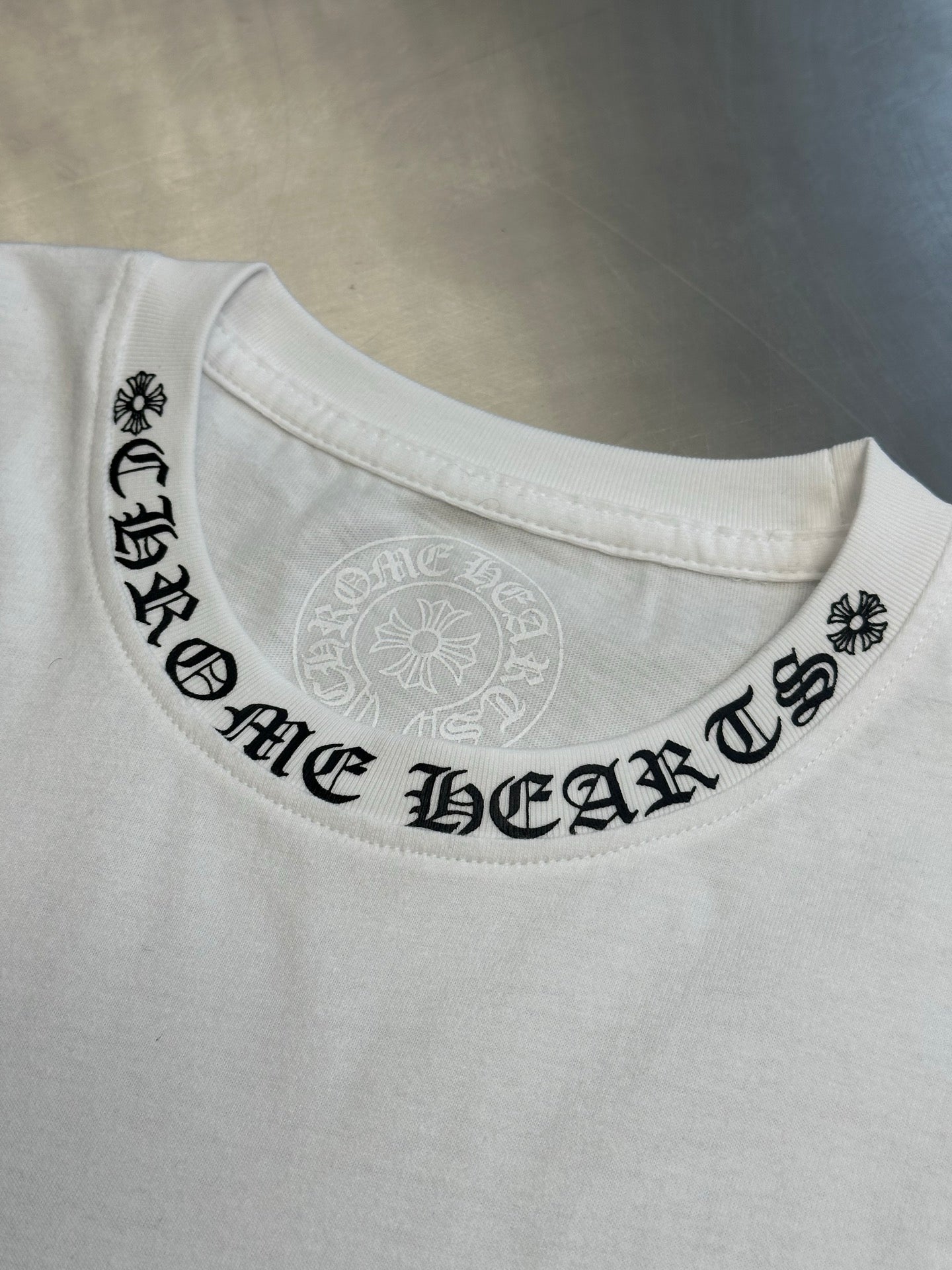 White T-shirt crew neck with HEART graphic and small icon details