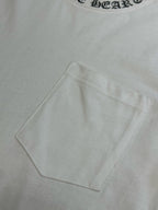 White T-shirt chest pocket detail with clean topstitching