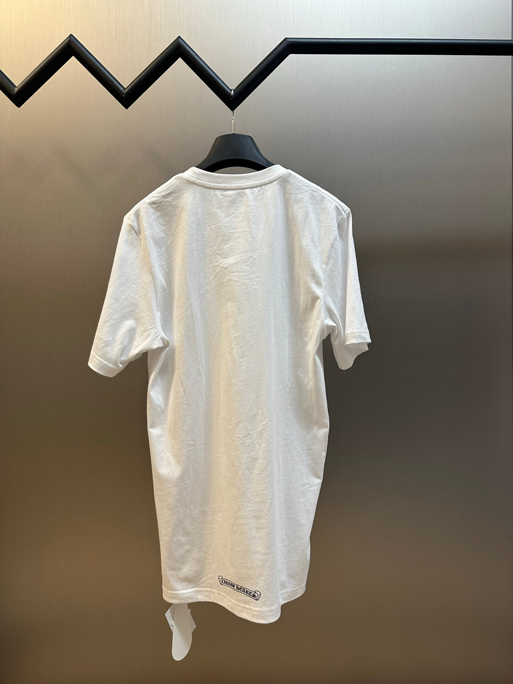 White short-sleeve T-shirt back view with small hem logo