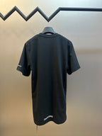 Black short-sleeve T-shirt back view with small logo detail at hem