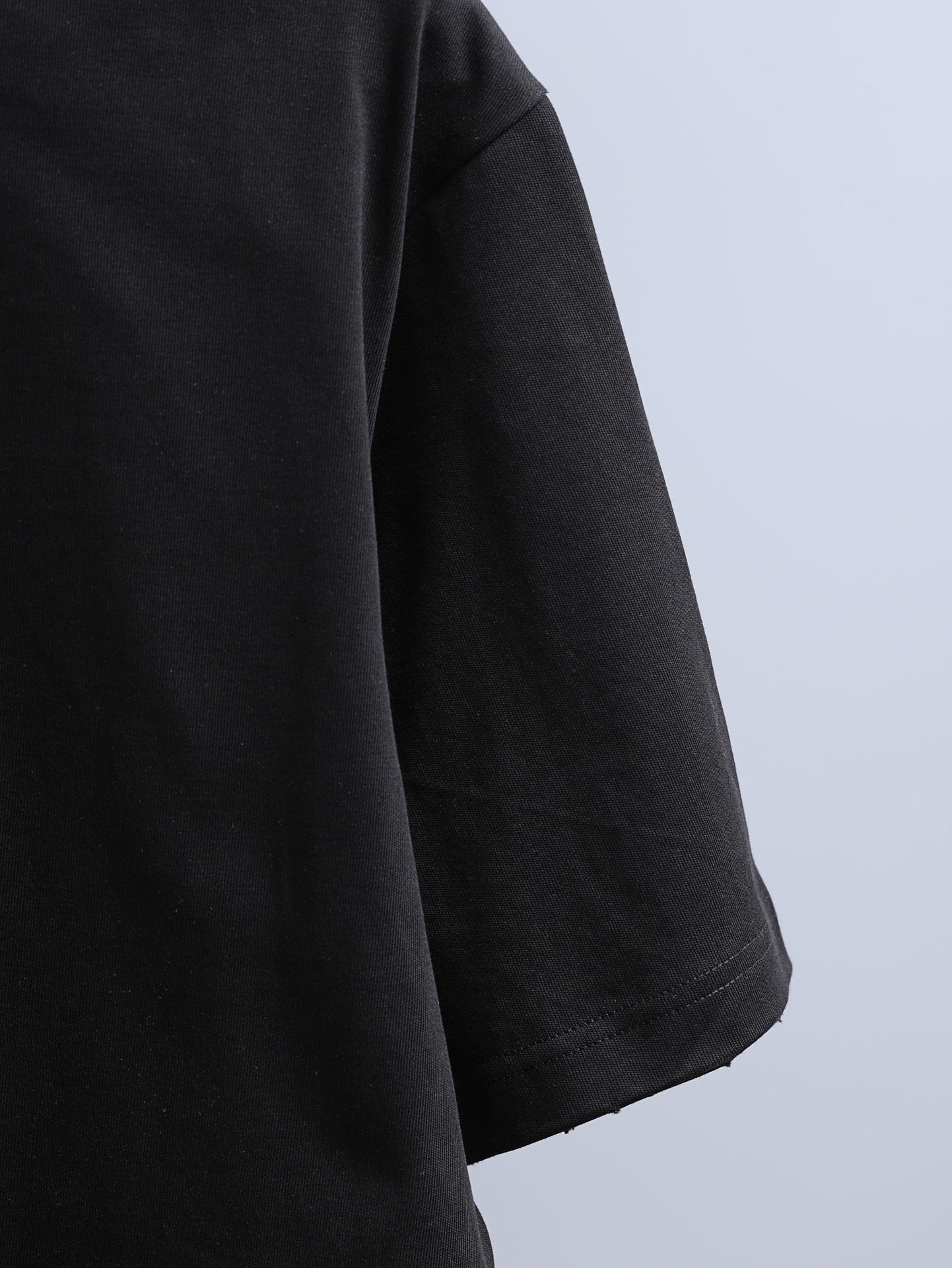 Off-White black T-shirt sleeve and side seam view