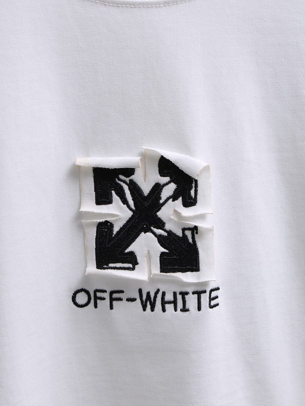 Off-White™ off white crewneck T-shirt with bold black graphic logo patch.
