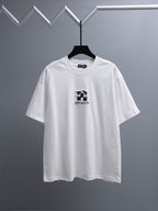 Off-White™ off white crewneck T-shirt on hanger with small chest logo print.