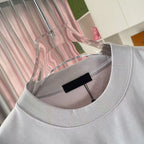 Short-sleeve T-shirt neckline, light gray ribbed crew collar with interior tag