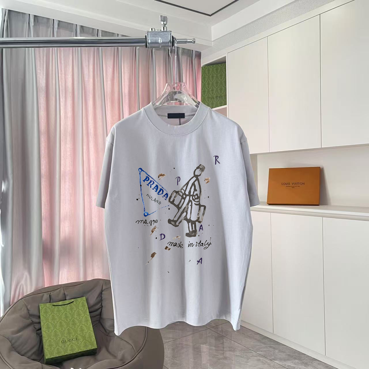 Prada short-sleeve T-shirt in light gray with front graphic print and crew neckline