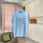 Light blue Prada short-sleeve T-shirt with multicolor graphic print, crew neck