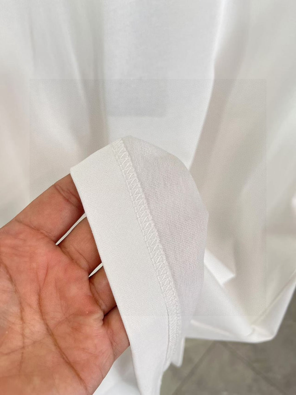 Prada white T-shirt fabric with ribbed cuff and shoulder seam