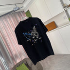 Black Prada short-sleeve T-shirt with colorful chest graphic, angled view