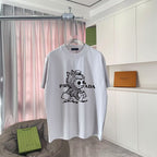 Prada short-sleeve T-shirt, light gray, crew neck, cartoon logo graphic on front