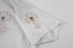 White short-sleeve T-shirt with cross embroidery on sleeve and cuff area