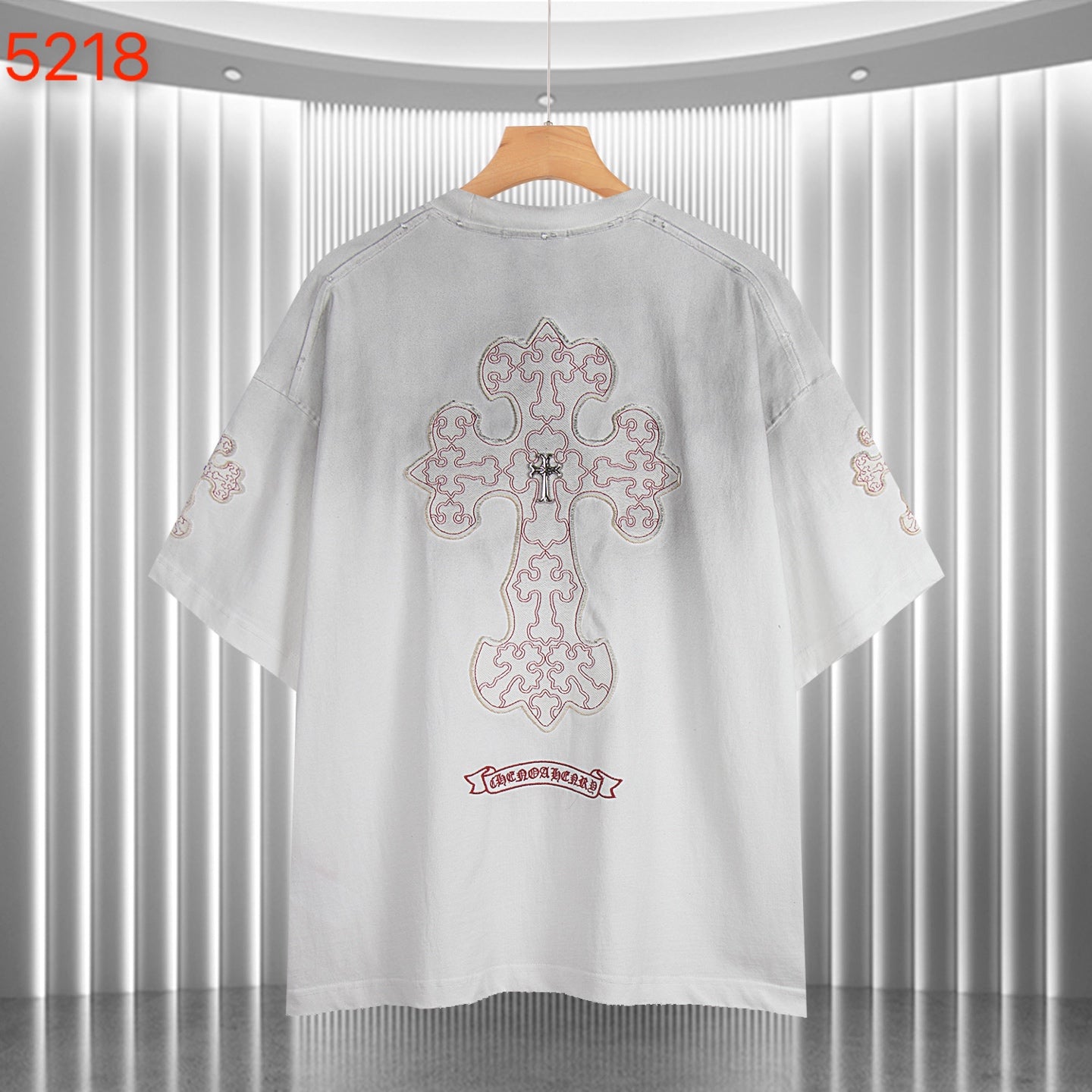 White short-sleeve T-shirt with large embroidered cross graphic on back