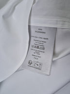 Dior white shirt care label inside collar with fabric and washing instructions
