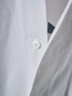 Dior white shirt button close-up on front placket