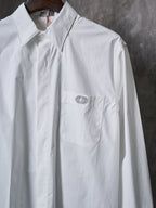 Dior white long-sleeve button-up shirt with chest pocket and small embroidered logo