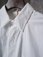 Dior white long-sleeve shirt collar close-up with stitched placket and neckline