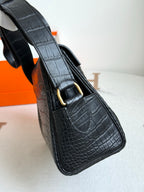 Hermes croc-textured crossbody bag, dark blue, gold buckle detail on side strap