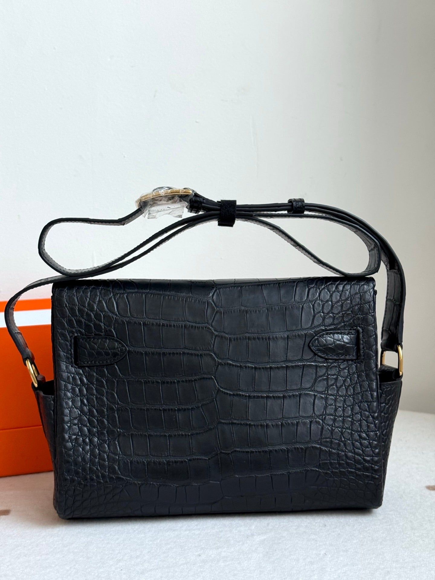 Hermes croc-textured shoulder bag, dark blue with gold turn-lock and adjustable strap